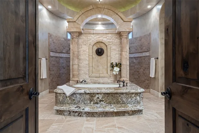 a view of a bathroom with mirror