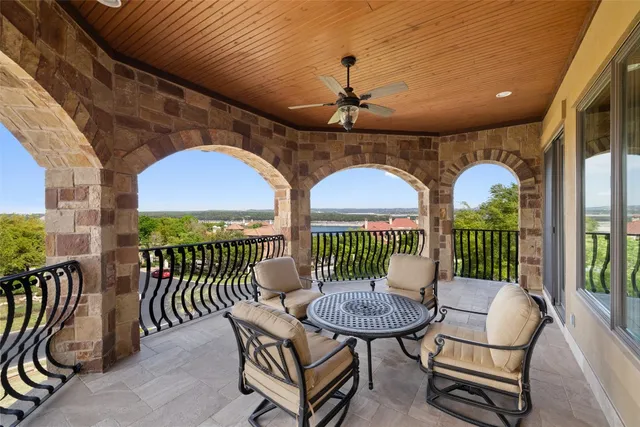 a view of a chairs and table in the patio