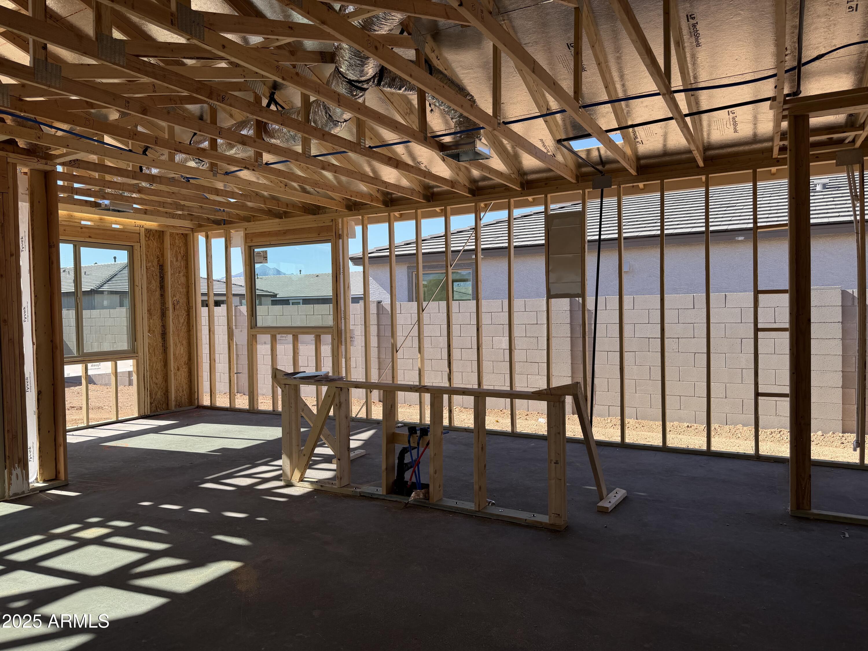 5517 West Hayduk Road Laveen, AZ 85339 - Photo 6 of 28 a view of a room with furniture and floor to ceiling window