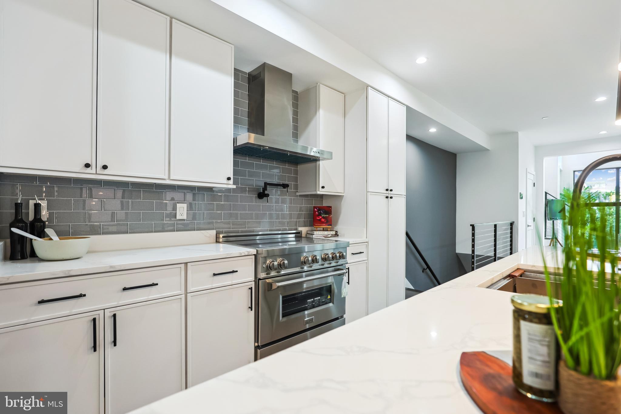 304 K Street Northeast, Unit 1 Washington, DC 20002 - Photo 2 of 33 Induction Range with Vented Hood
