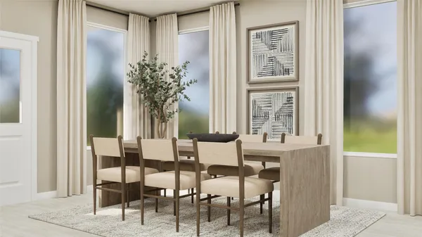 a view of a dining room with furniture and window