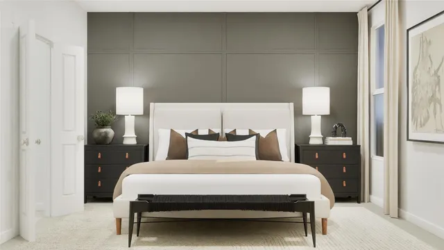 a bedroom with a bed and a night stand