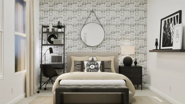 a bedroom with a bed and a mirror