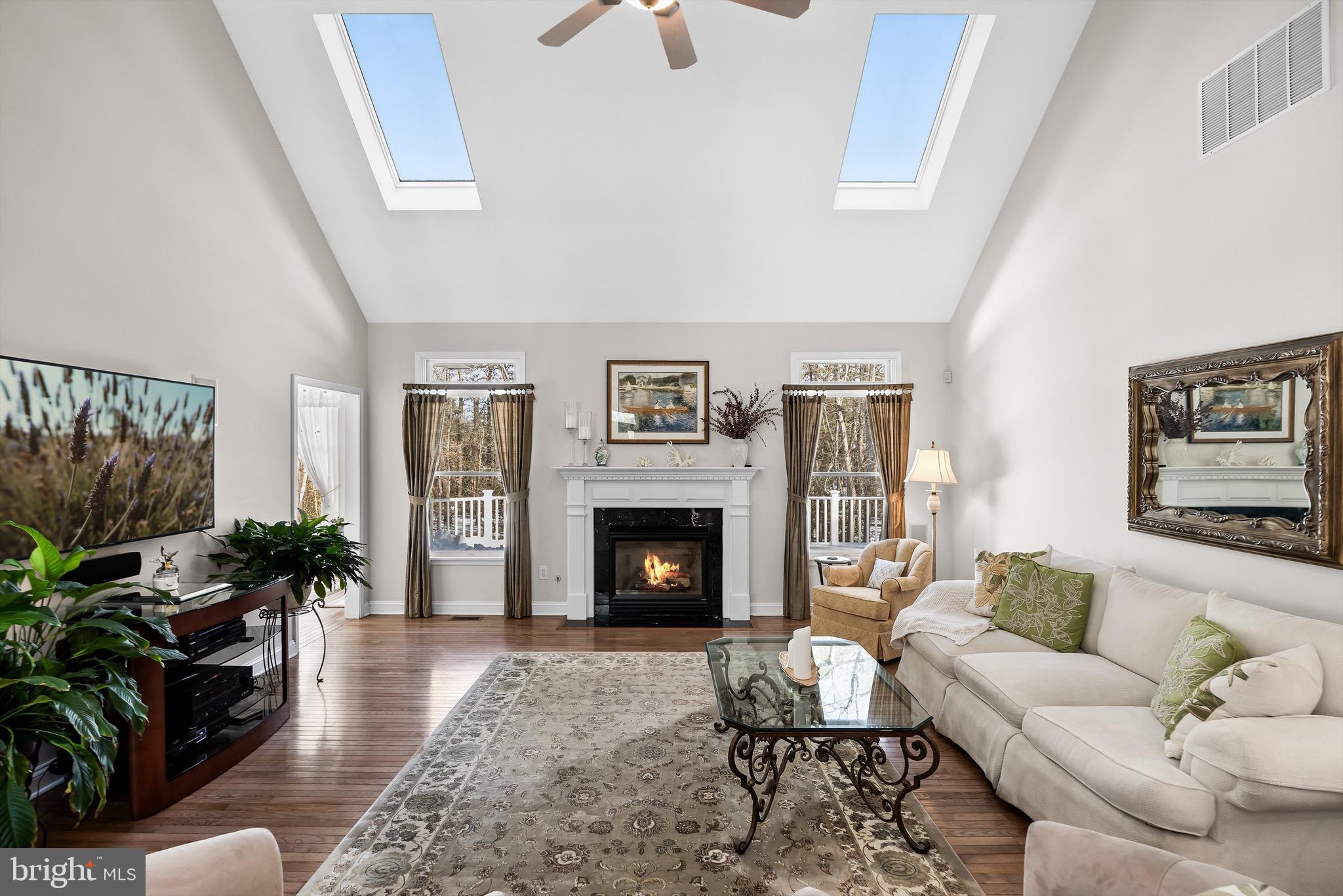 19 Big Look Trail Medford, NJ 08055 - Photo 12 of 61 a living room with furniture and a fireplace