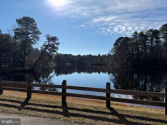 a view of a road with an ocean view