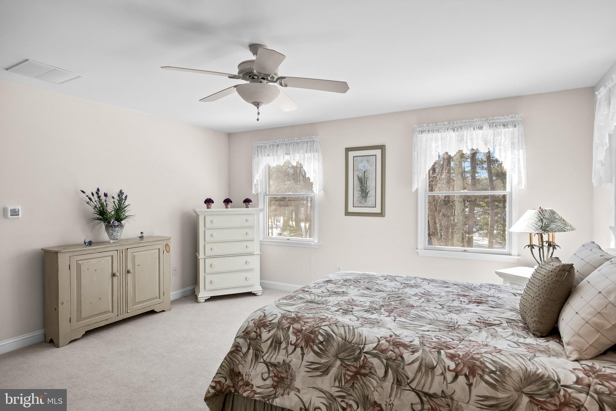 19 Big Look Trail Medford, NJ 08055 - Photo 30 of 61 a bedroom with a bed and a dresser