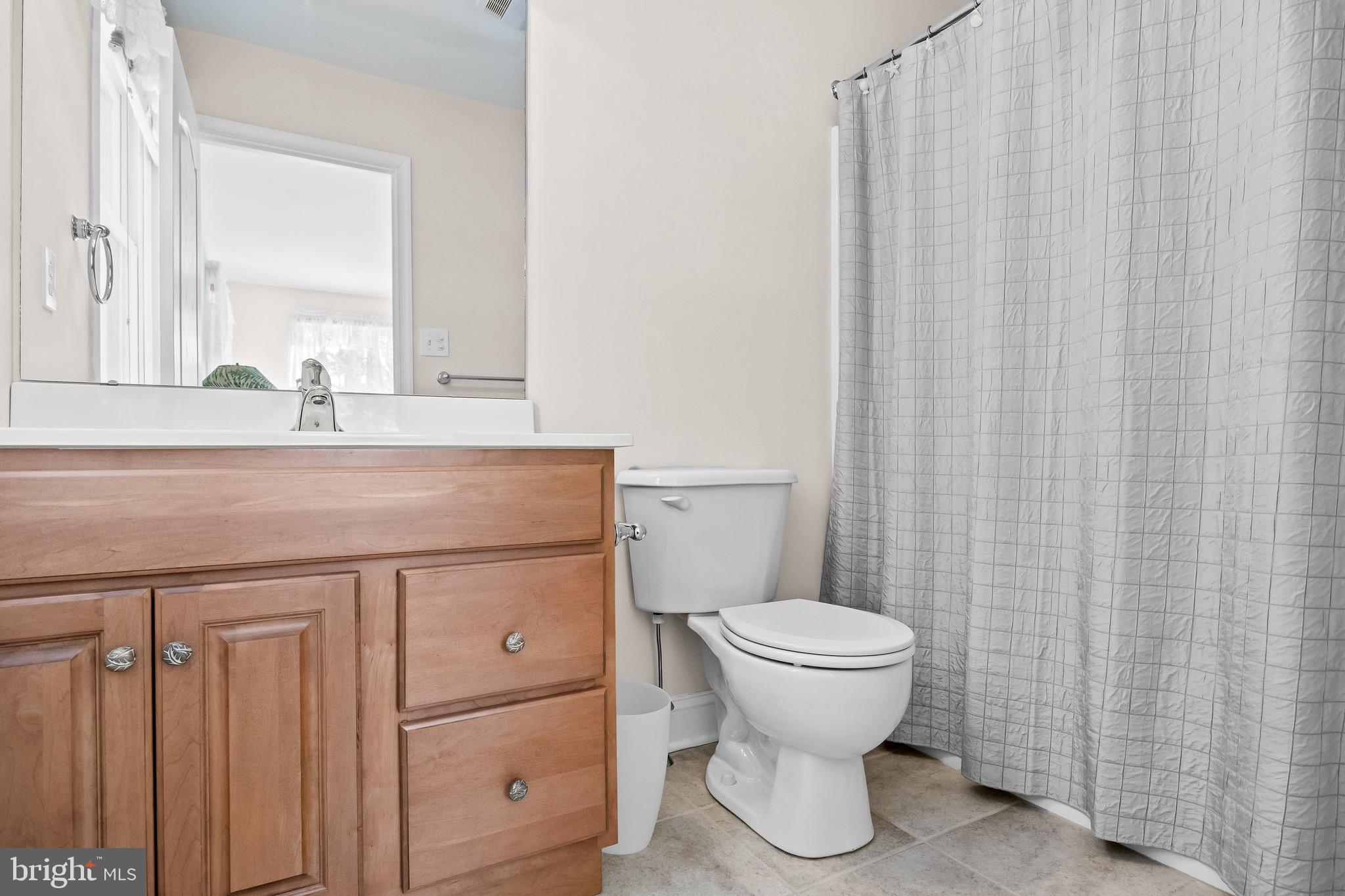 19 Big Look Trail Medford, NJ 08055 - Photo 31 of 61 a bathroom with a toilet a sink and a mirror