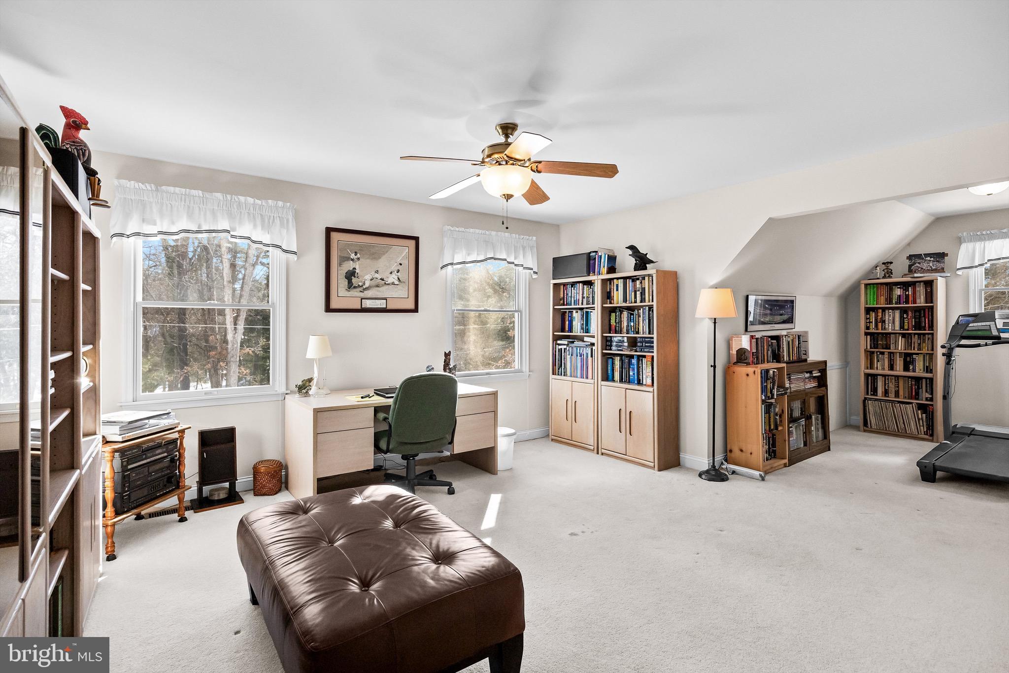 19 Big Look Trail Medford, NJ 08055 - Photo 33 of 61 a living room with furniture gym equipment and a window