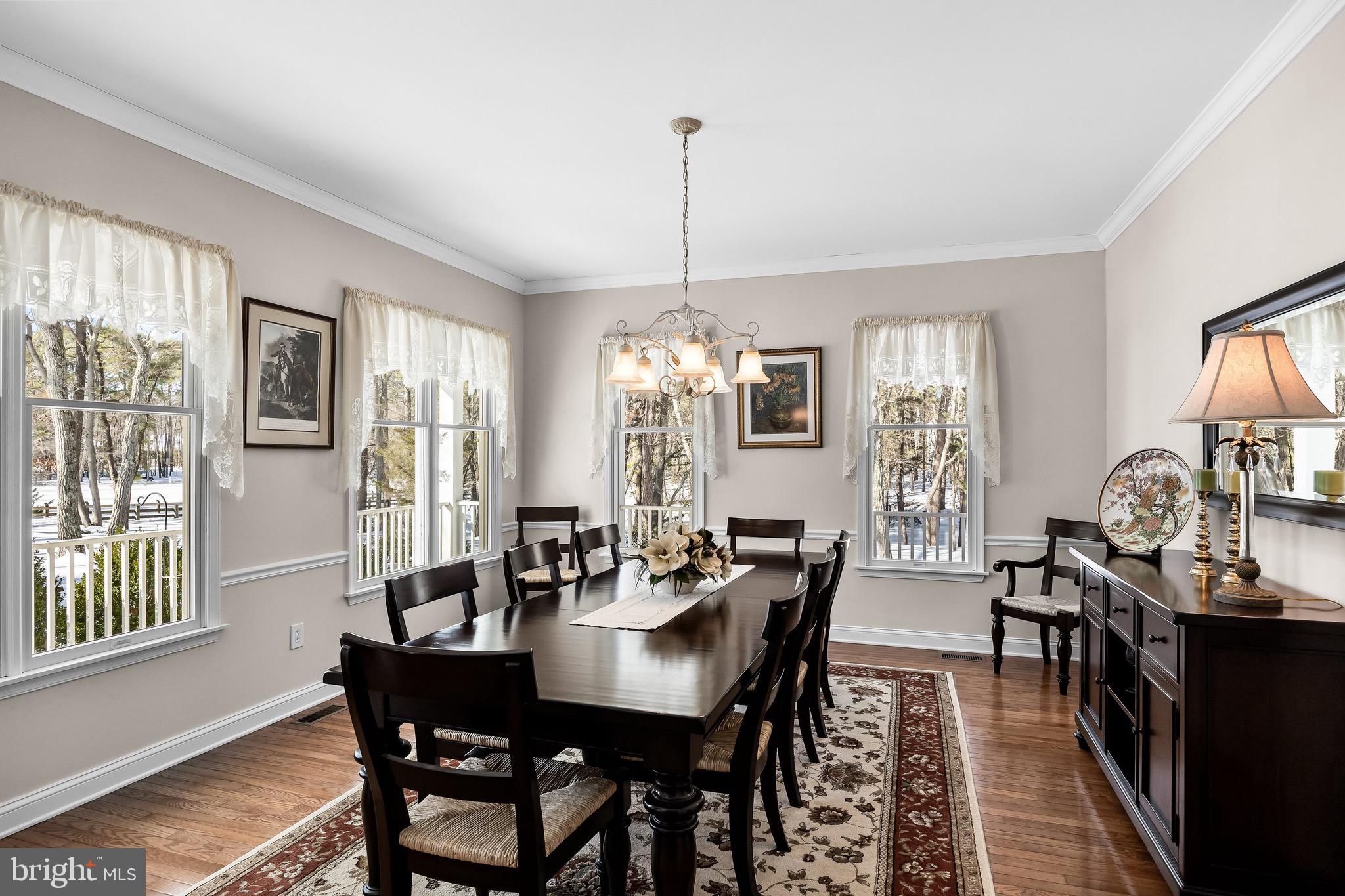 19 Big Look Trail Medford, NJ 08055 - Photo 9 of 61 a view of a a dining room with furniture window and wooden floor