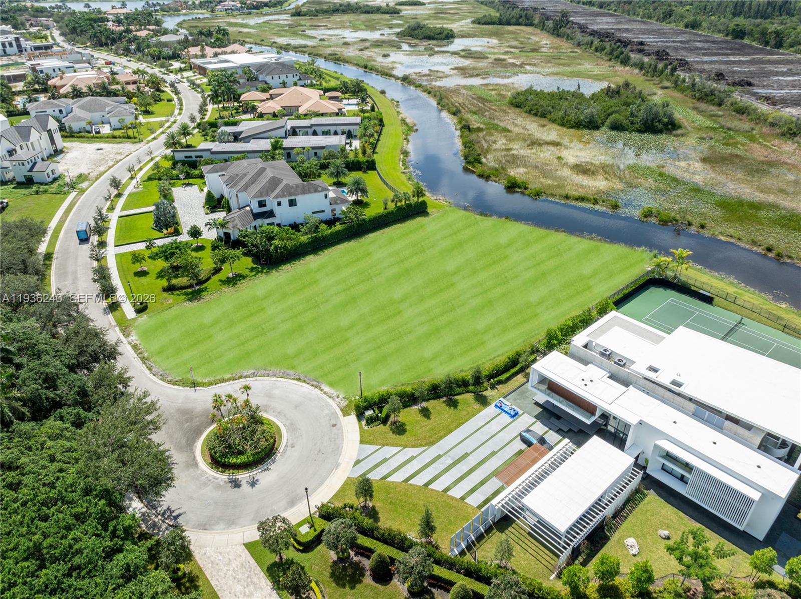2757 Lake Ridge Lane Weston, FL 33332 - Photo 33 of 33 an aerial view of residential house with outdoor space