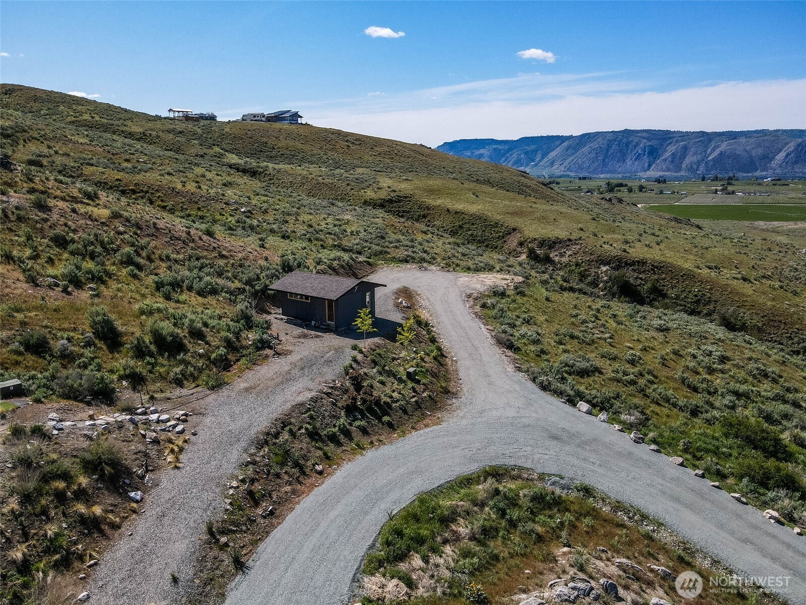 0 Plata Road Brewster, WA 98812 - Photo 2 of 28 a view of a mountain with a garden