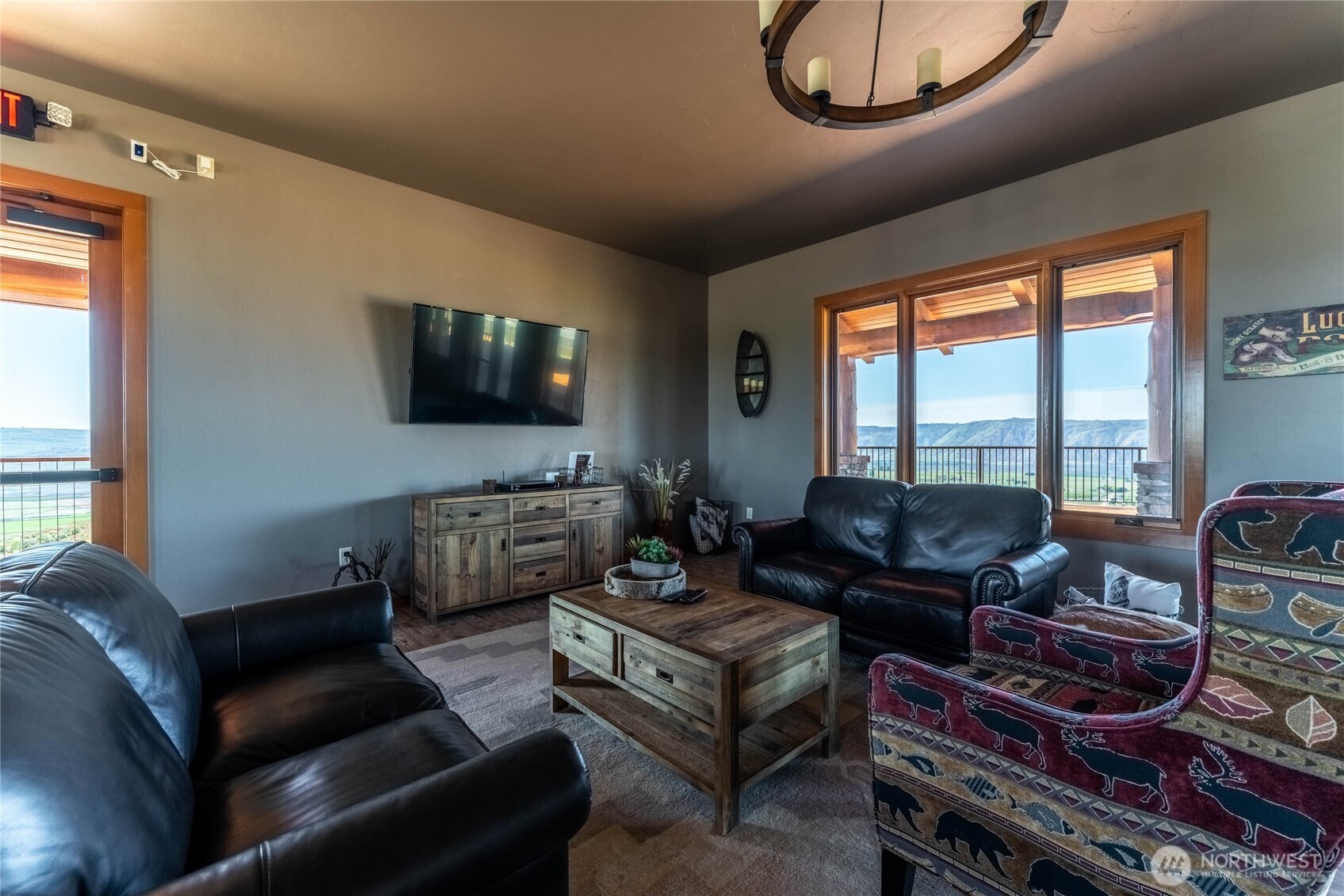 0 Plata Road Brewster, WA 98812 - Photo 24 of 28 a living room with furniture and a flat screen tv