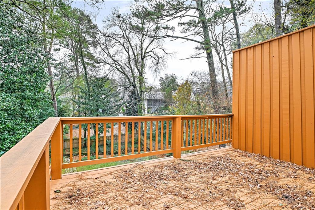 2188 Edison Avenue Northeast Atlanta, GA 30305 - Photo 14 of 51 a view of a wooden fence with a large trees
