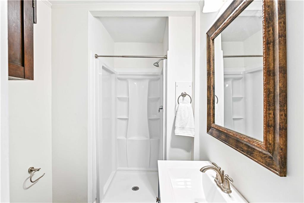 2188 Edison Avenue Northeast Atlanta, GA 30305 - Photo 25 of 51 a bathroom with a bathtub and a shower