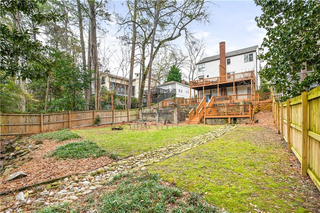 2188 Edison Avenue Northeast Atlanta, GA 30305 - Photo 38 of 51 a view of a house with backyard and a tree