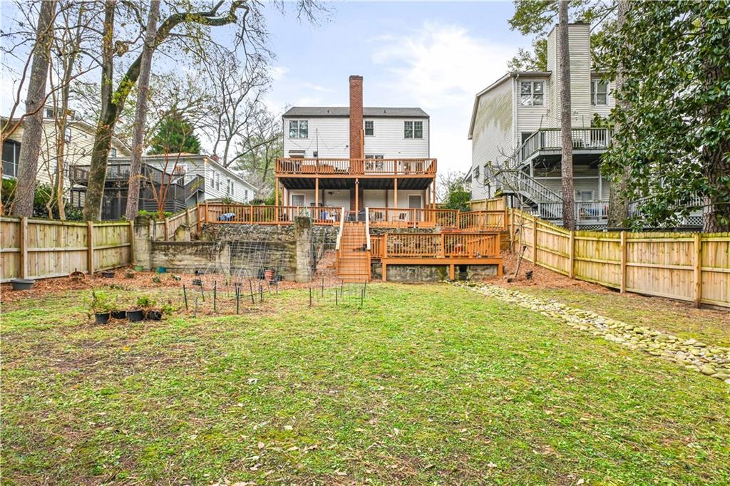 2188 Edison Avenue Northeast Atlanta, GA 30305 - Photo 40 of 51 a view of a house with a yard and sitting area