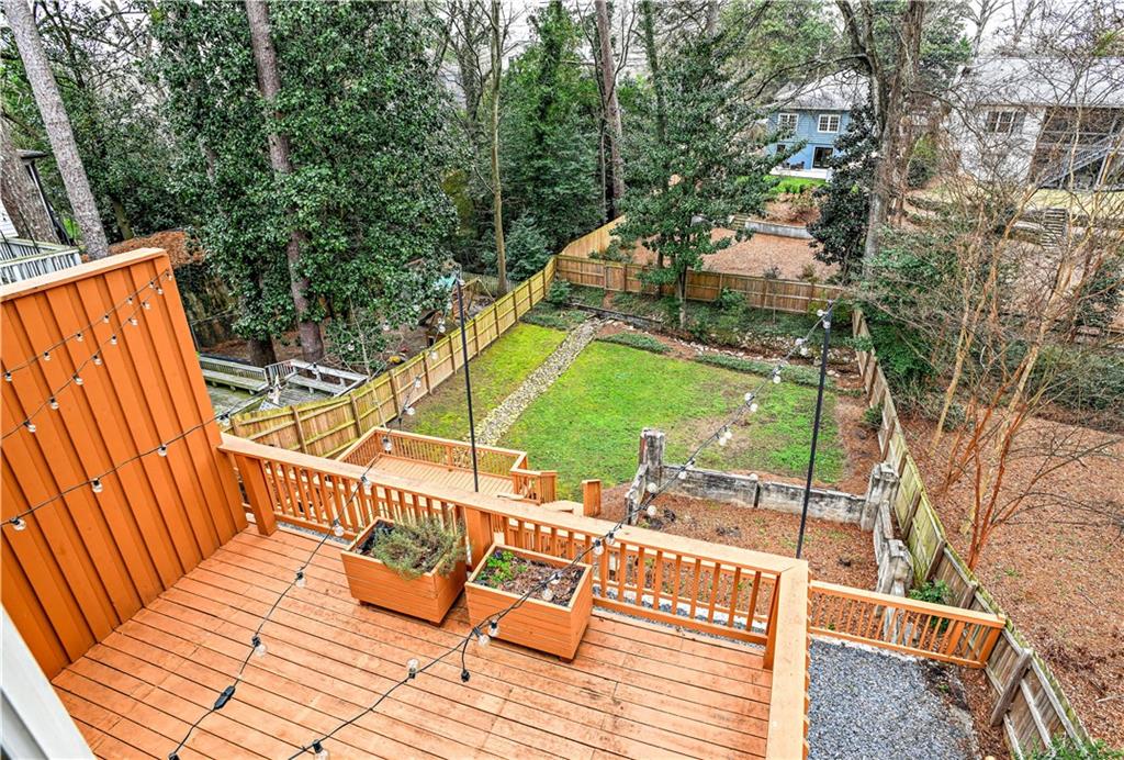 2188 Edison Avenue Northeast Atlanta, GA 30305 - Photo 49 of 51 a view of balcony with wooden floor and outdoor seating