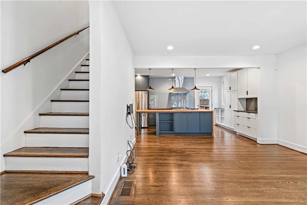 2188 Edison Avenue Northeast Atlanta, GA 30305 - Photo 7 of 51 a view of a kitchen with wooden floor and electronic appliances