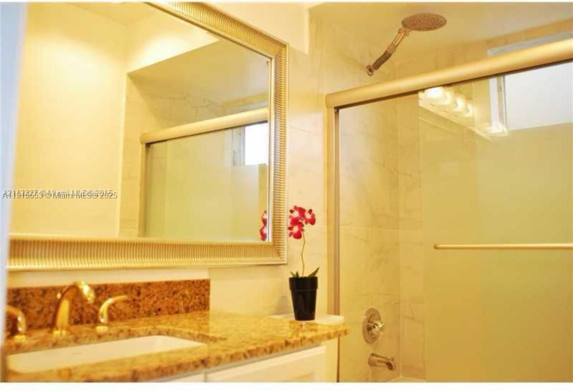 2451 Southwest 82nd Avenue, Unit 106 Davie, FL 33324 - Photo 8 of 10 a bathroom with a shower