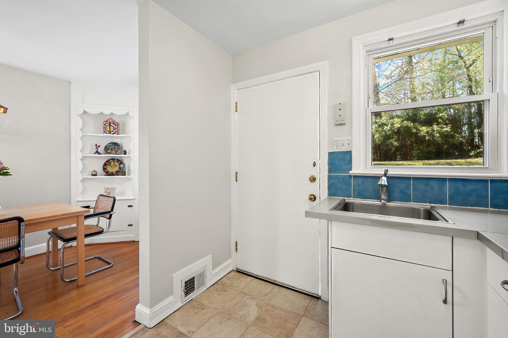 9704 Lorain Avenue Silver Spring, MD 20901 - Photo 11 of 43 a room with a sink and a window