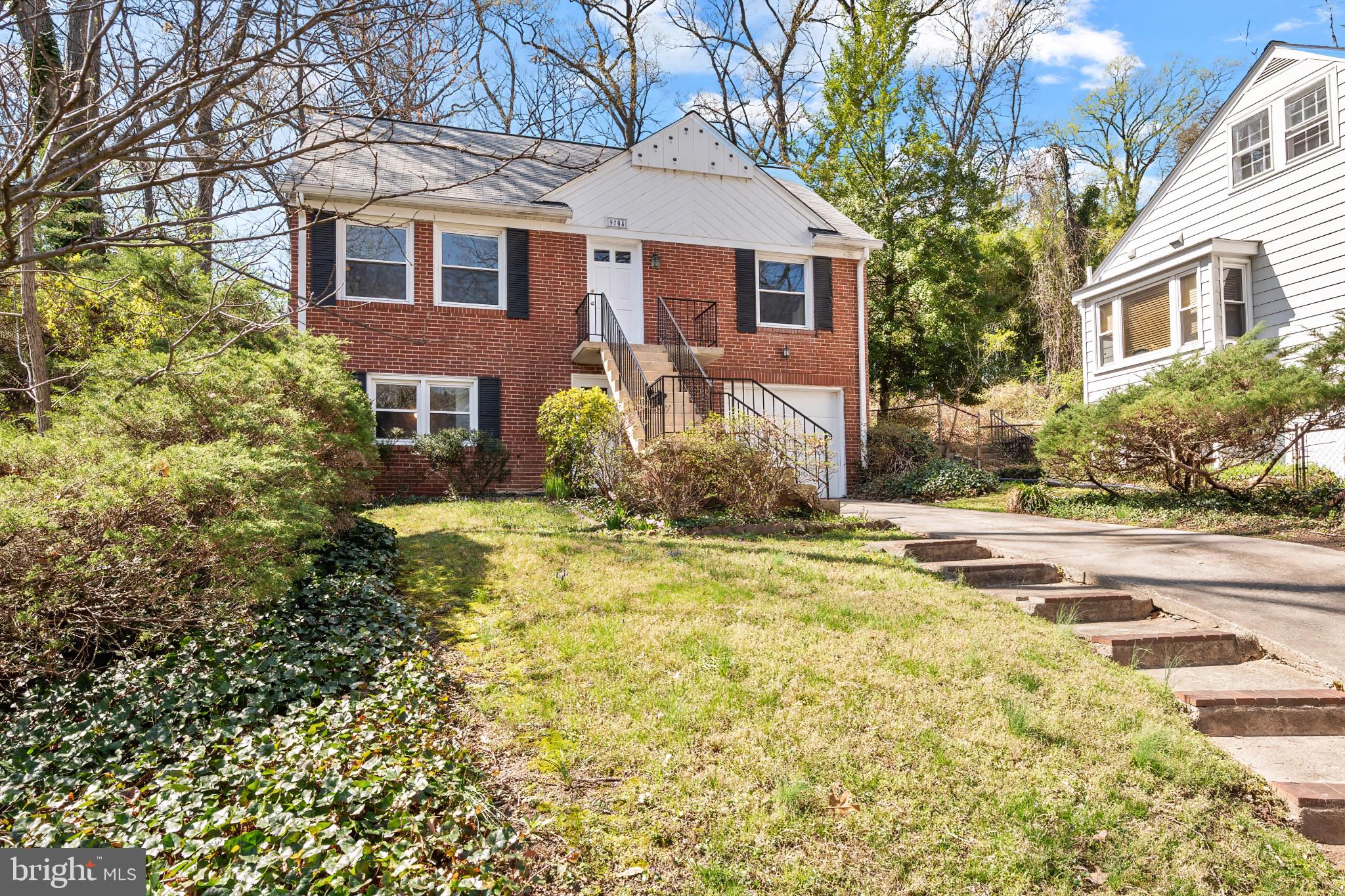 9704 Lorain Avenue Silver Spring, MD 20901 - Photo 3 of 43 a front view of a house with a yard