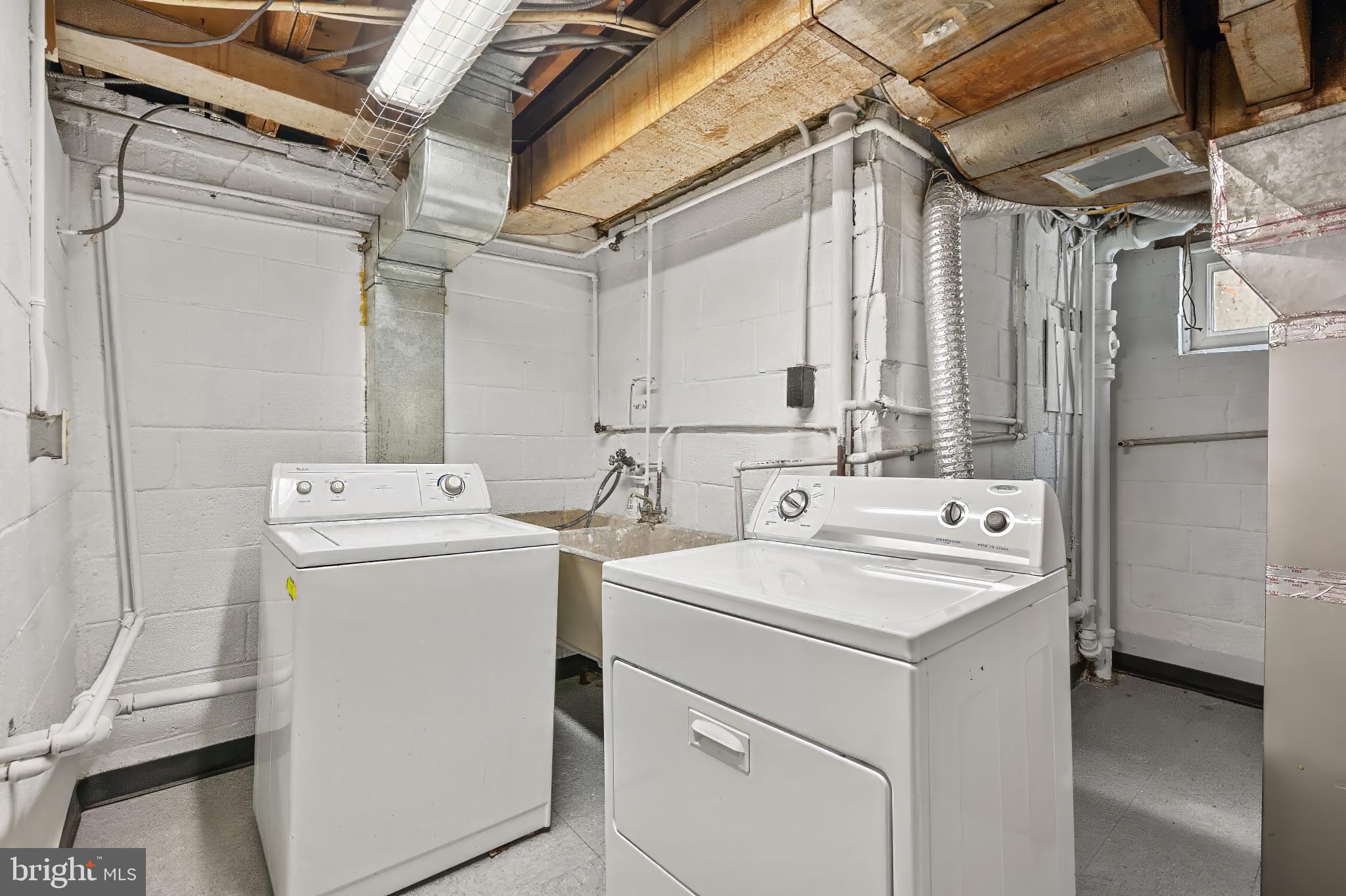 9704 Lorain Avenue Silver Spring, MD 20901 - Photo 31 of 43 a utility room with dryer and washer