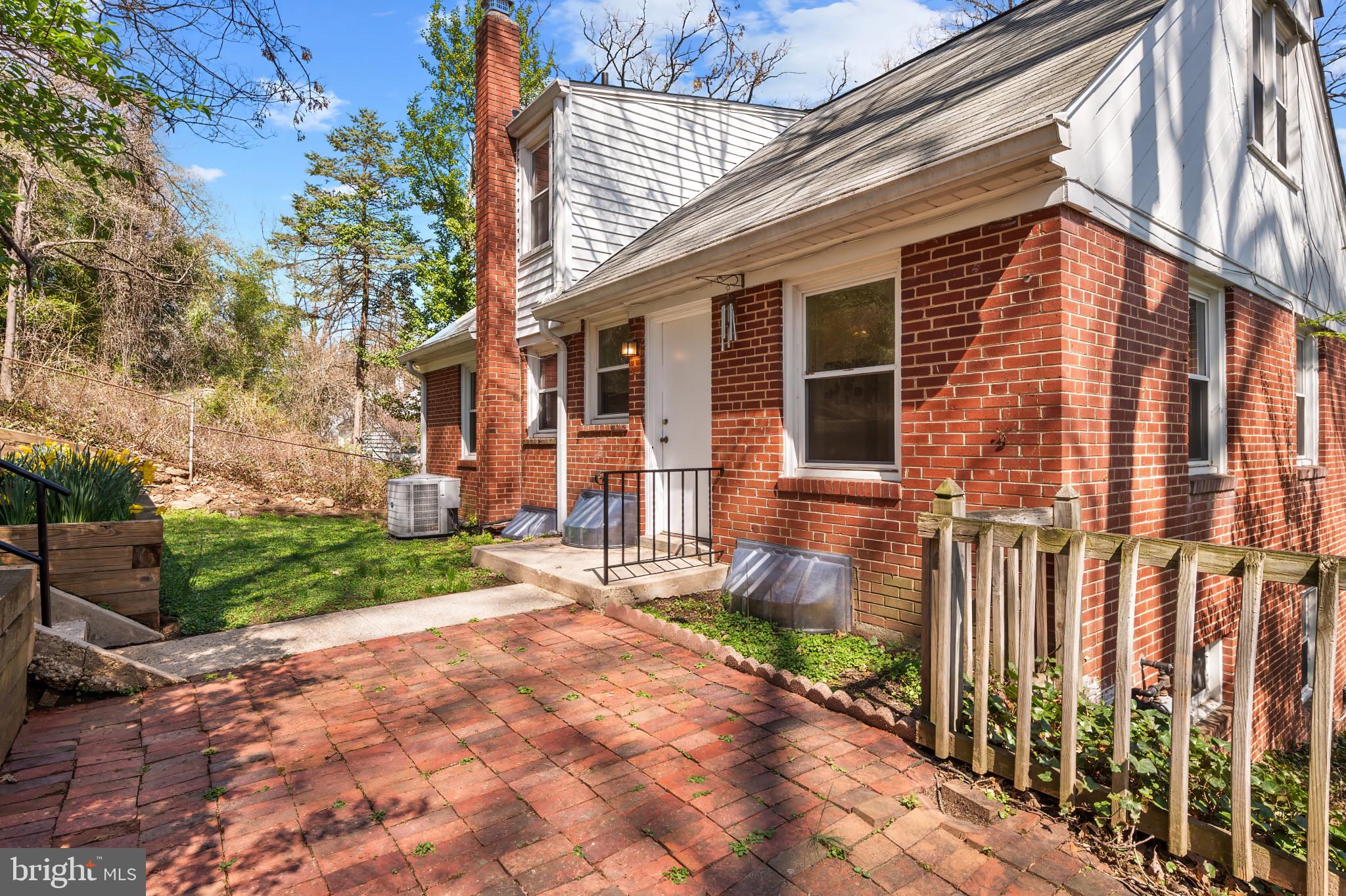 9704 Lorain Avenue Silver Spring, MD 20901 - Photo 32 of 43 a front view of a house with garden
