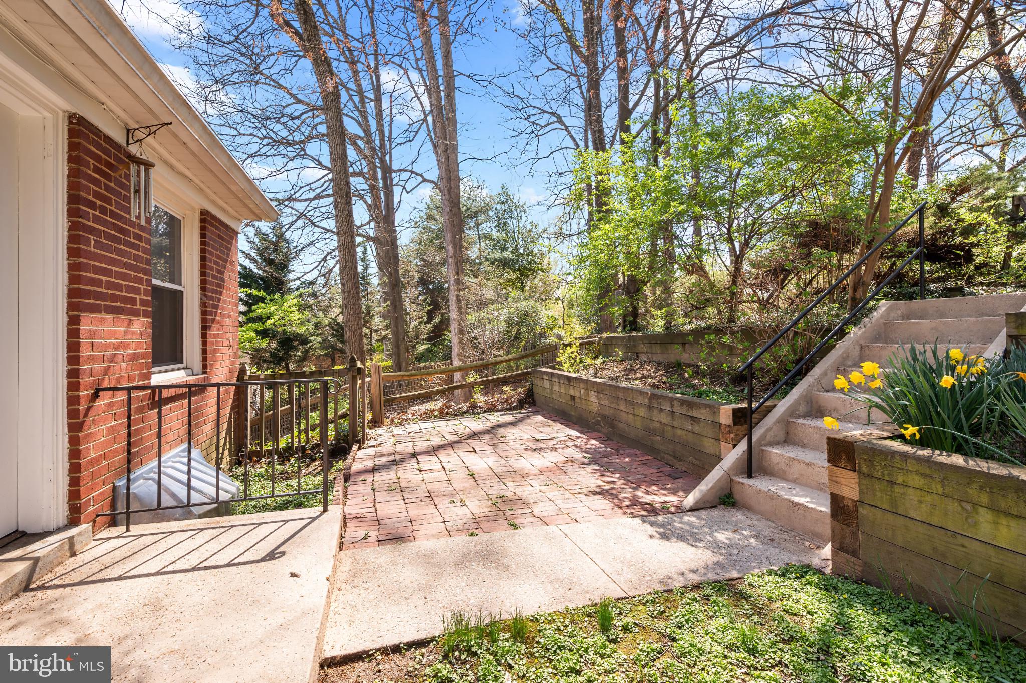 9704 Lorain Avenue Silver Spring, MD 20901 - Photo 33 of 43 a view of a backyard with sitting area