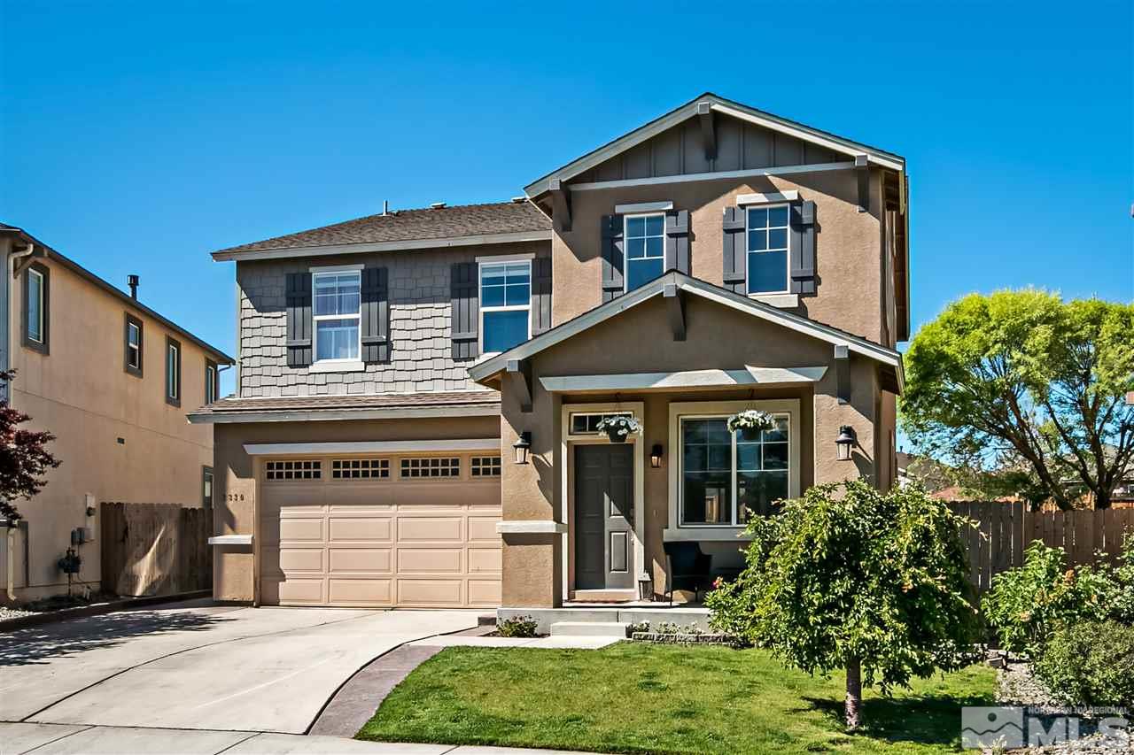 2330 Clementine Lane Reno, NV 89521 - Photo 1 of 32 a front view of a house with a yard