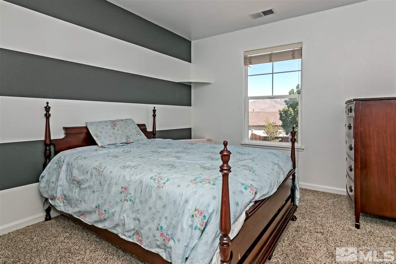 2330 Clementine Lane Reno, NV 89521 - Photo 20 of 32 a bedroom with bed and window