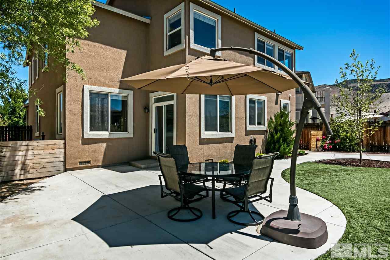 2330 Clementine Lane Reno, NV 89521 - Photo 32 of 32 a patio with a table and chairs