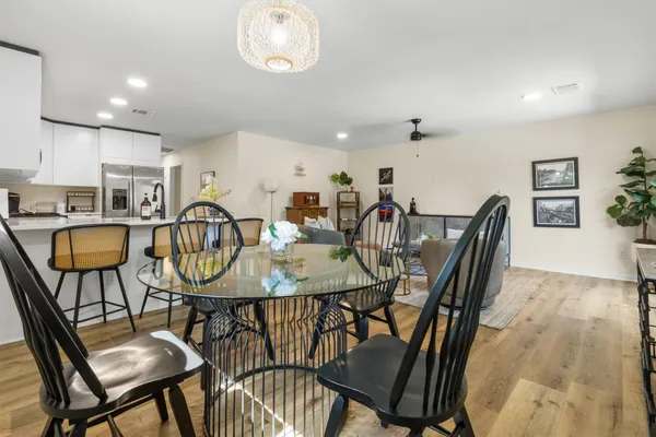a view of a dining room with furniture