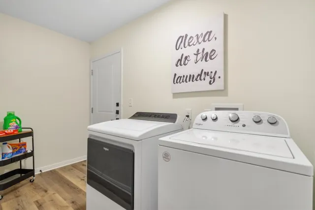 a utility room with dryer and washer