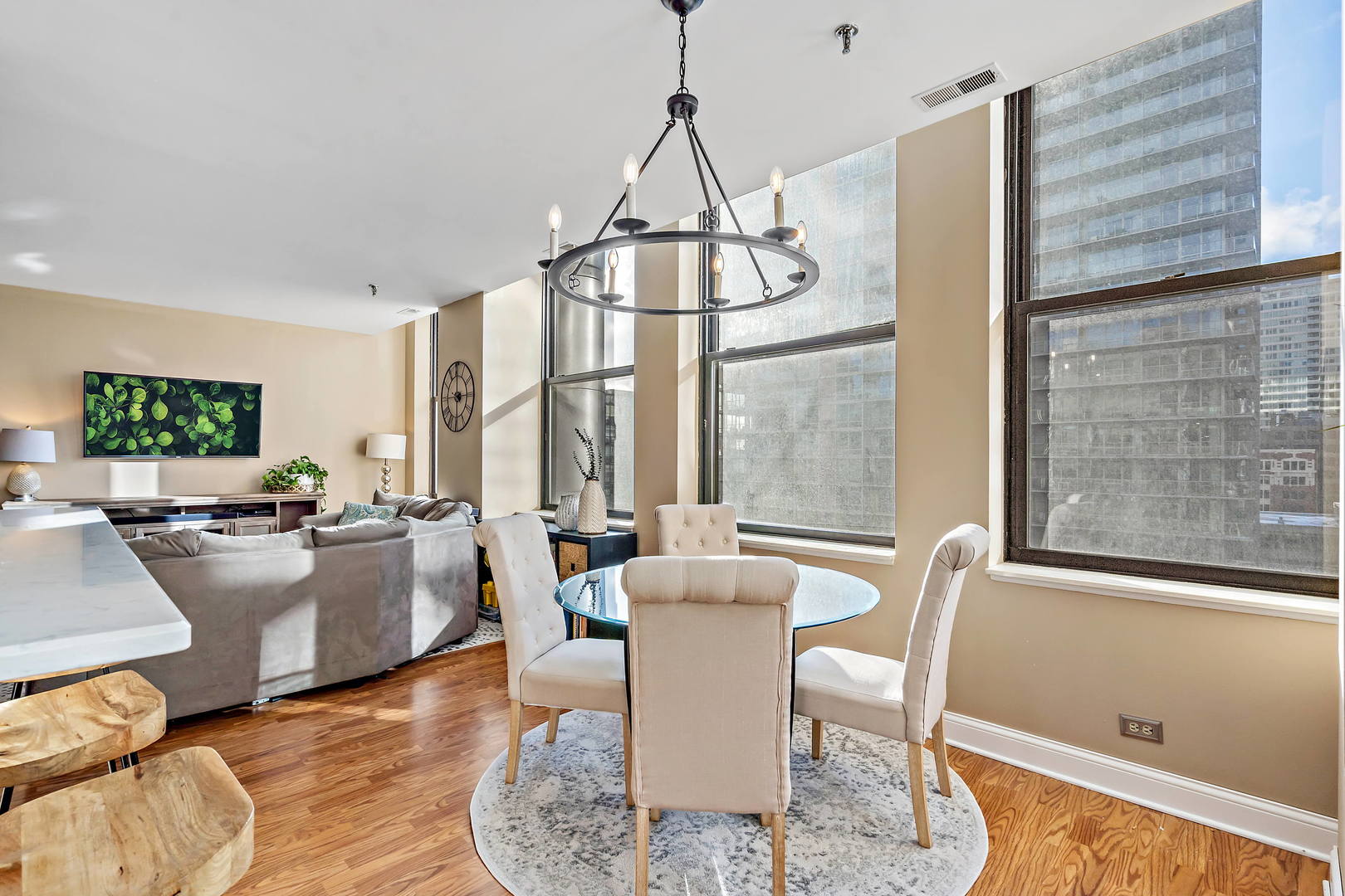 780 South Federal Street, Unit 804 Chicago, IL 60605 - Photo 9 of 15 a living room with furniture a window and a chandelier