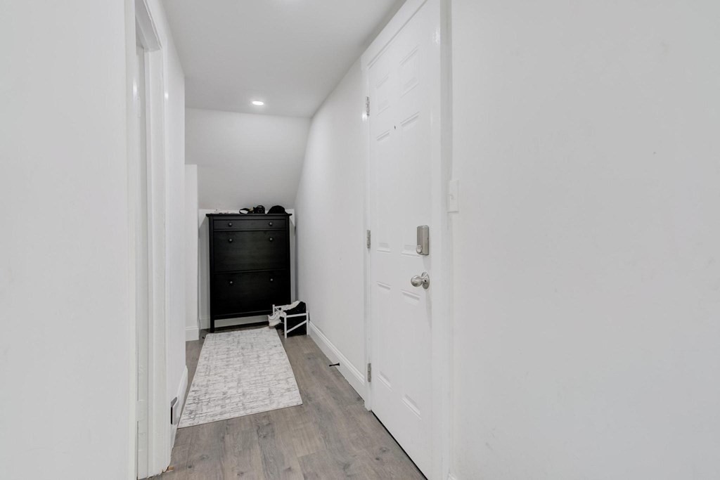 51 Prospect Street Woburn, MA 01801 - Photo 11 of 40 a view of a hallway with closet
