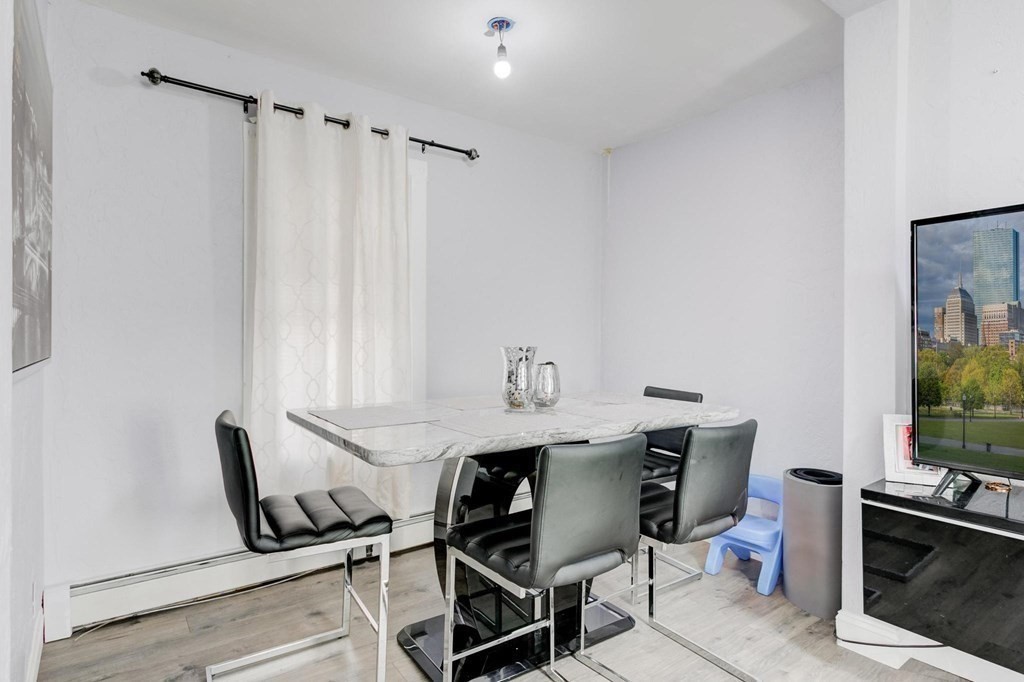 51 Prospect Street Woburn, MA 01801 - Photo 21 of 40 a workspace with furniture and window
