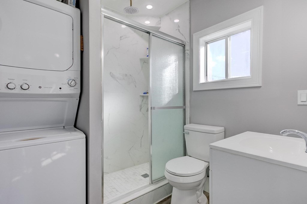 51 Prospect Street Woburn, MA 01801 - Photo 34 of 40 a bathroom with a toilet and a shower