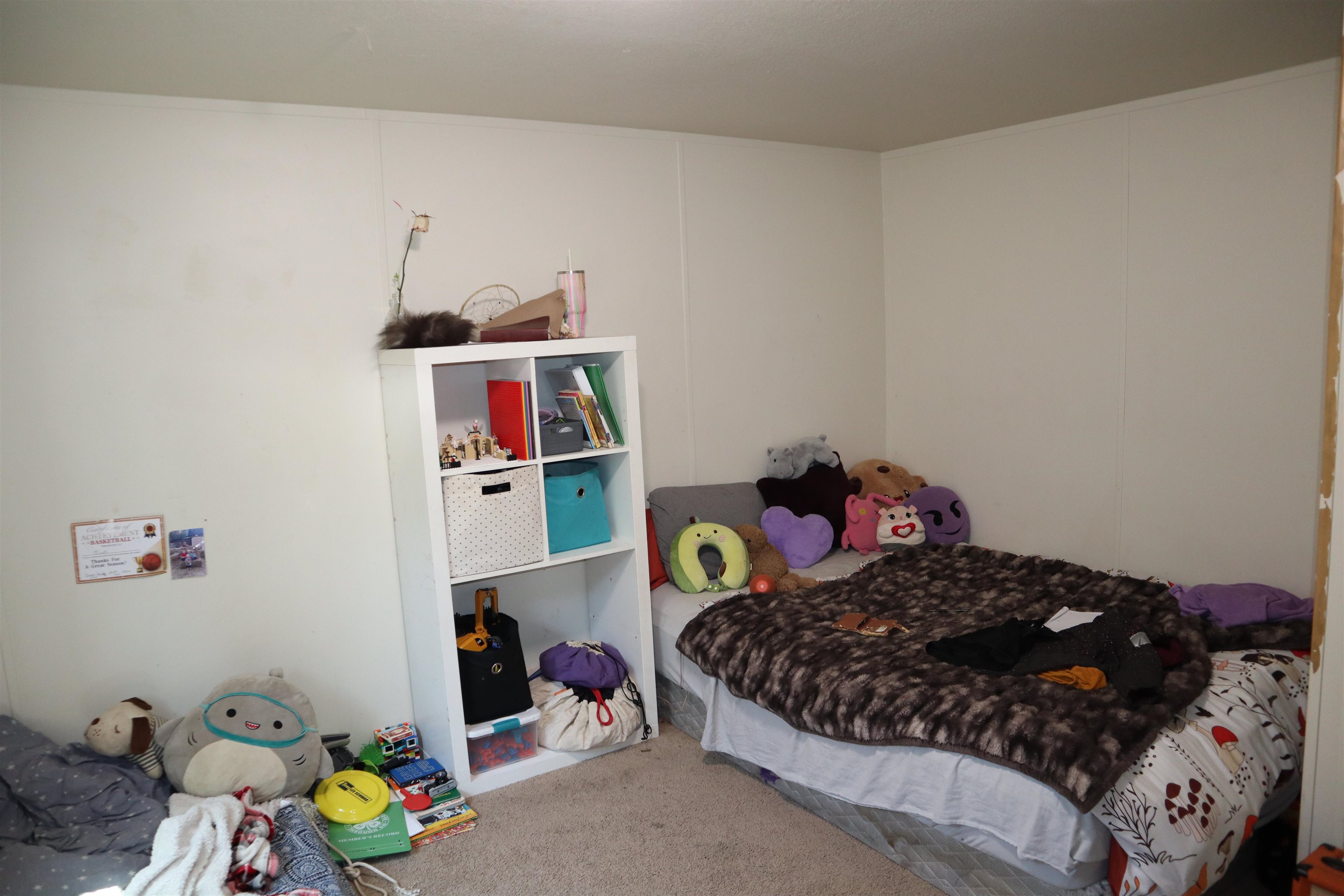 193 Fairground Road Quincy, CA 95971 - Photo 14 of 20 a bedroom with a bed and cabinets