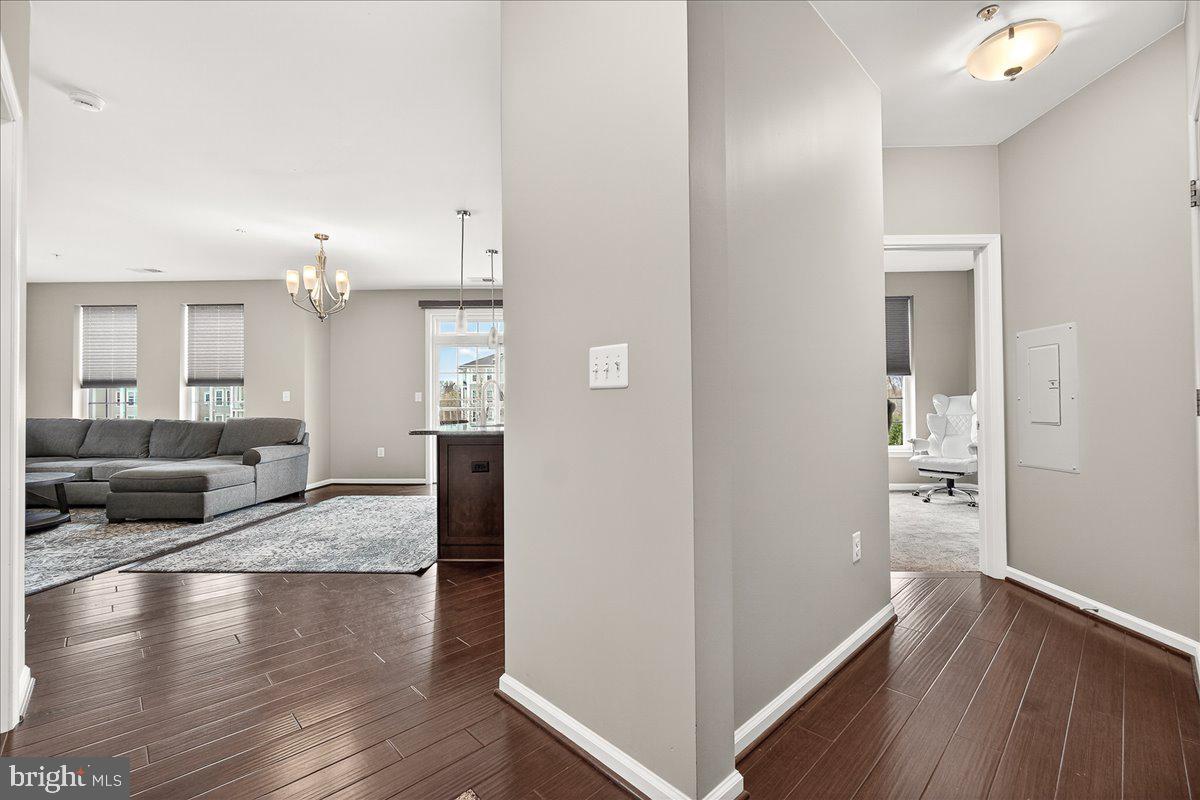 3911 Doc Berlin Drive, Unit 37 Silver Spring, MD 20906 - Photo 26 of 35 a view of a living room kitchen and a wooden floor
