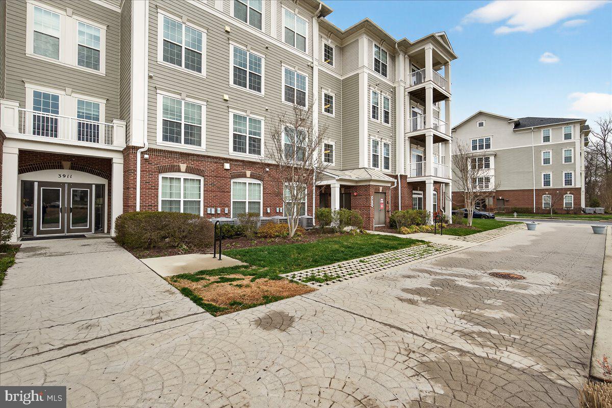 3911 Doc Berlin Drive, Unit 37 Silver Spring, MD 20906 - Photo 33 of 35 a view of a building with a street