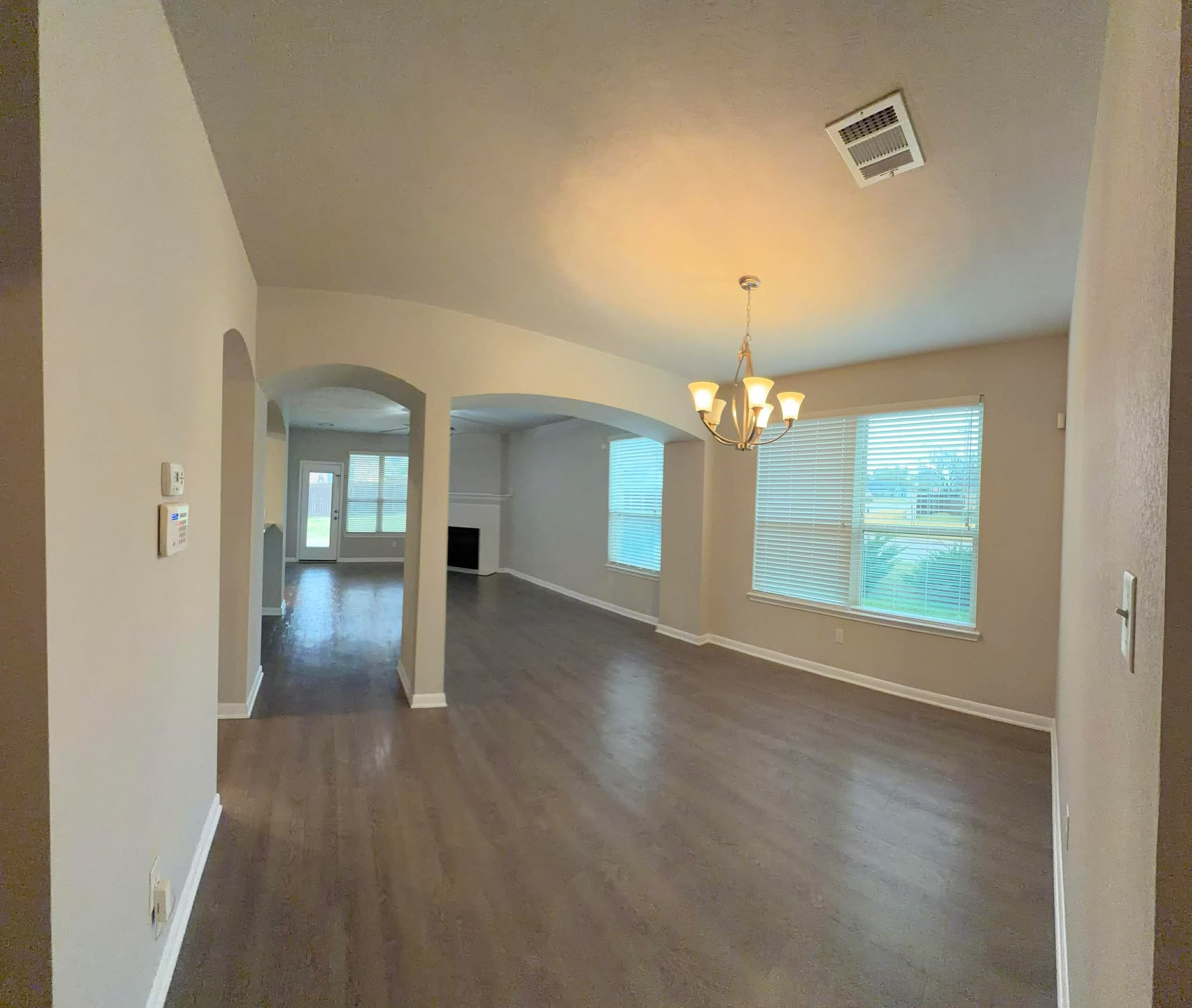 1841 Basin Trail Brenham, TX 77833 - Photo 16 of 49 Dining to Hallway to back door