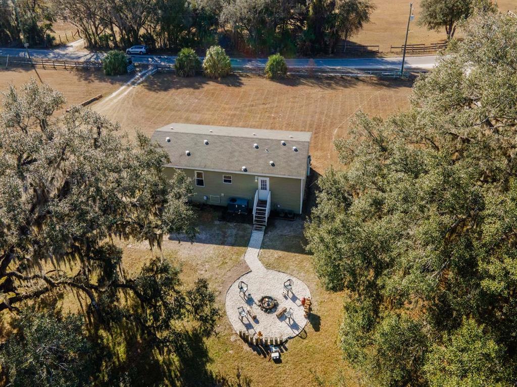 22457 Northeast 130th Court Road Fort McCoy, FL 32134 - Photo 36 of 43 a view of a backyard