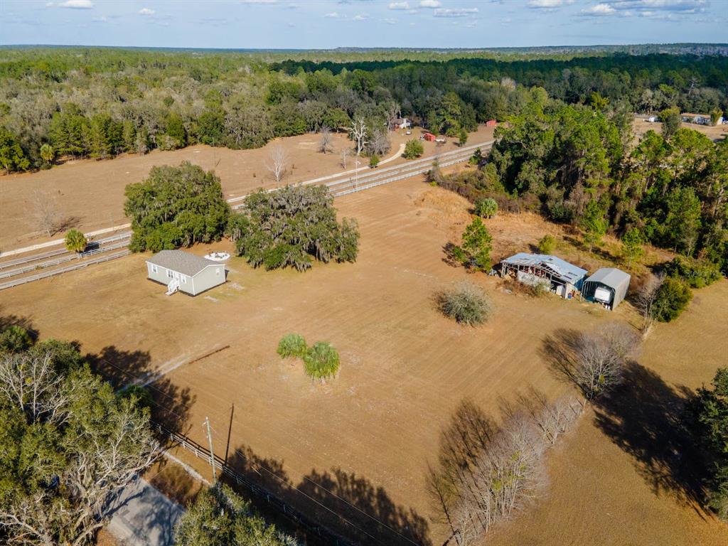 22457 Northeast 130th Court Road Fort McCoy, FL 32134 - Photo 41 of 43 a view of lake view and mountain view