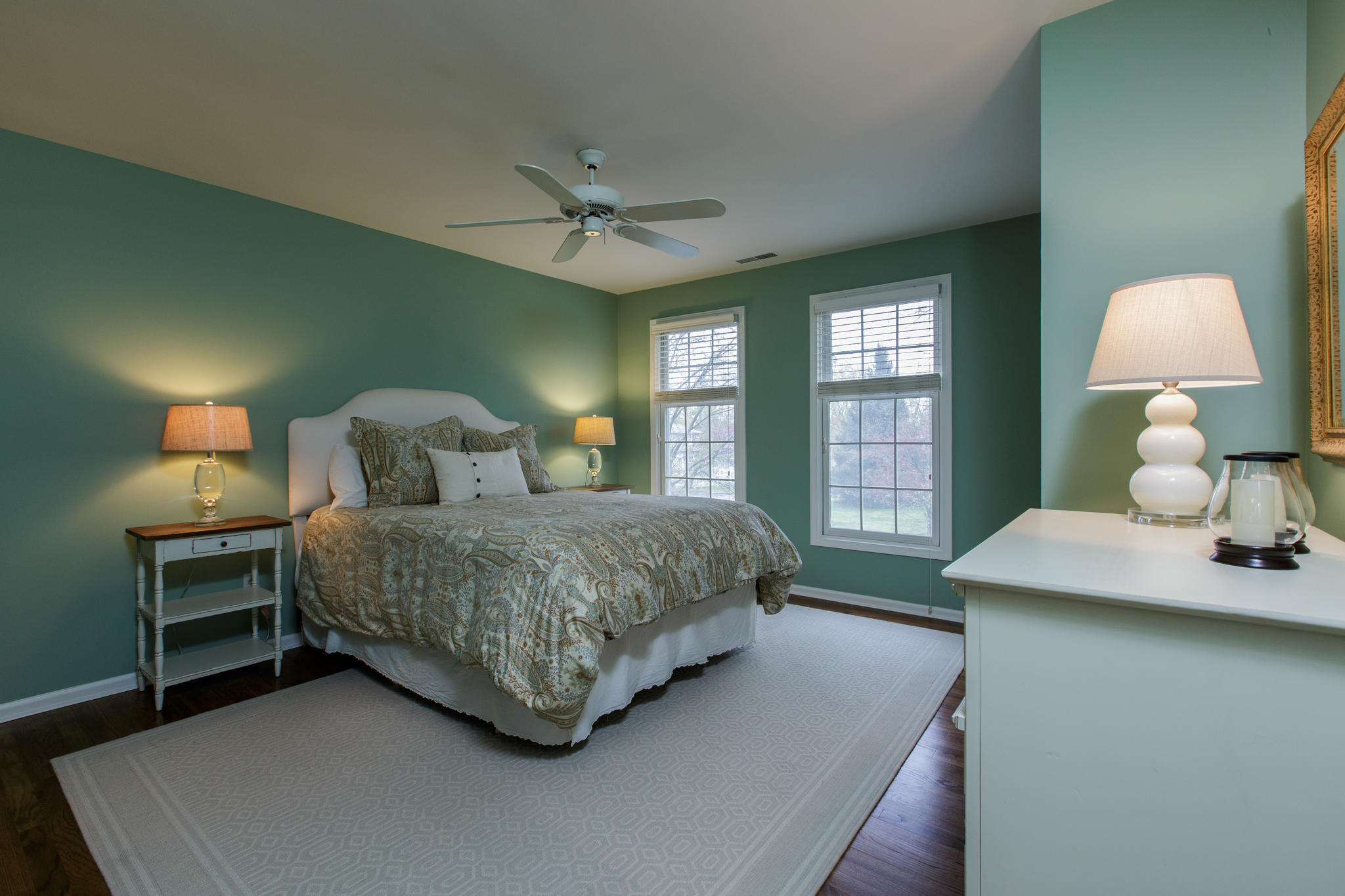 8 Pond Ridge Lane Norwalk, CT 06853 - Photo 12 of 17 a bedroom with a bed painting on wall and a window