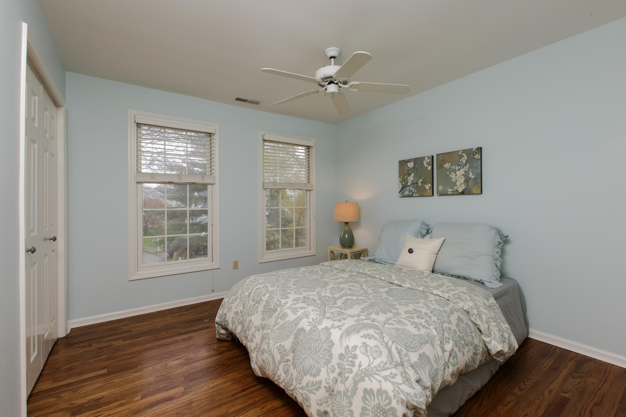 8 Pond Ridge Lane Norwalk, CT 06853 - Photo 14 of 17 a bedroom with a bed and wooden floor