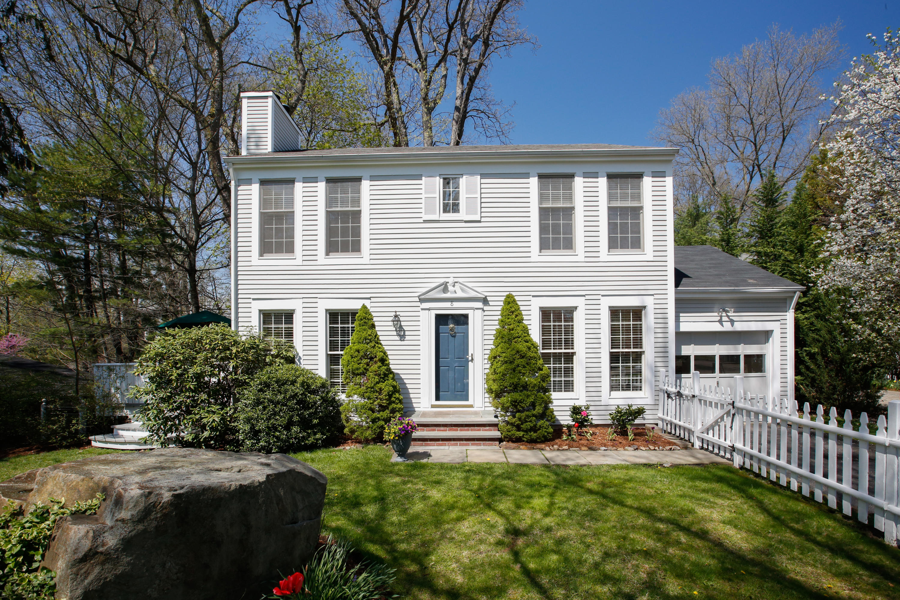 8 Pond Ridge Lane Norwalk, CT 06853 - Photo 2 of 17 a front view of house with yard and green space