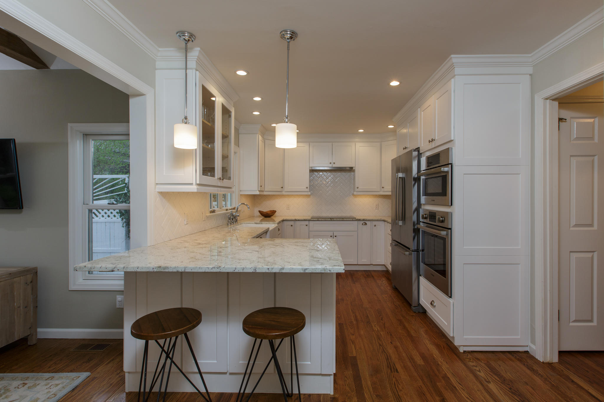 8 Pond Ridge Lane Norwalk, CT 06853 - Photo 10 of 17 a kitchen with stainless steel appliances granite countertop a sink and a refrigerator