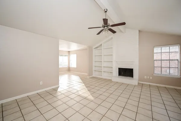 a view of an empty room and window