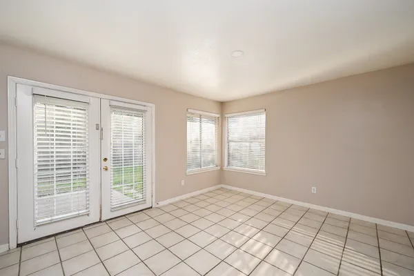 a view of an empty room and window