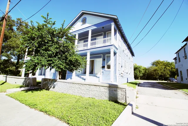 a view of a house with a swimming pool